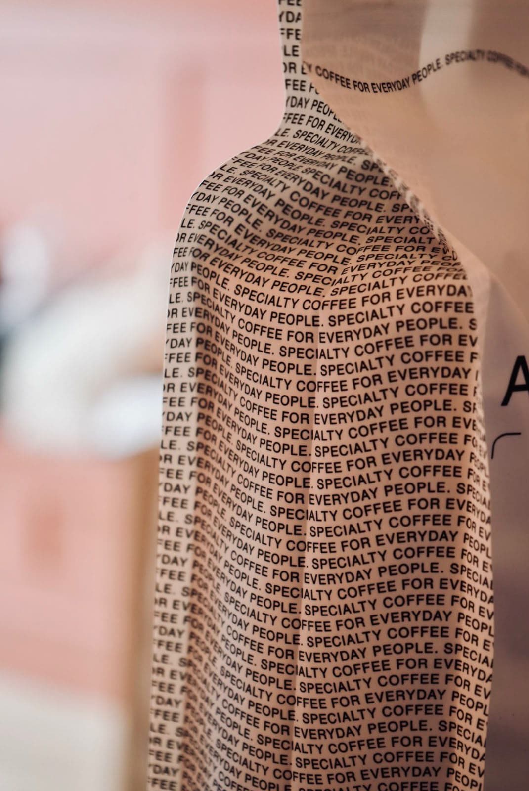 A bag of speciality coffee beans printed with 'specialty coffee for everyday people'